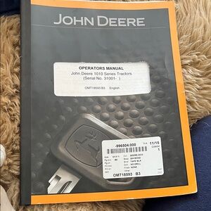 John Deere Black and Orange Operators Manual